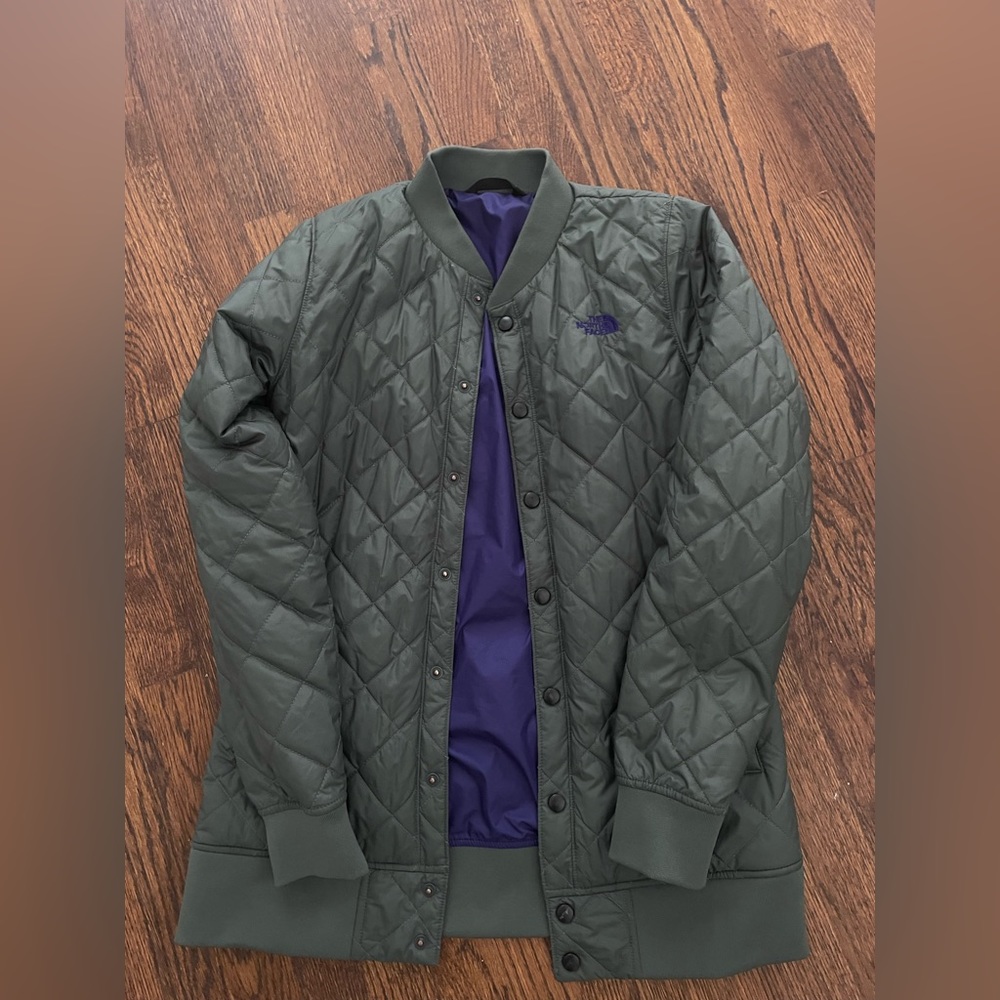 Purple and green north face jacket in perfect condition